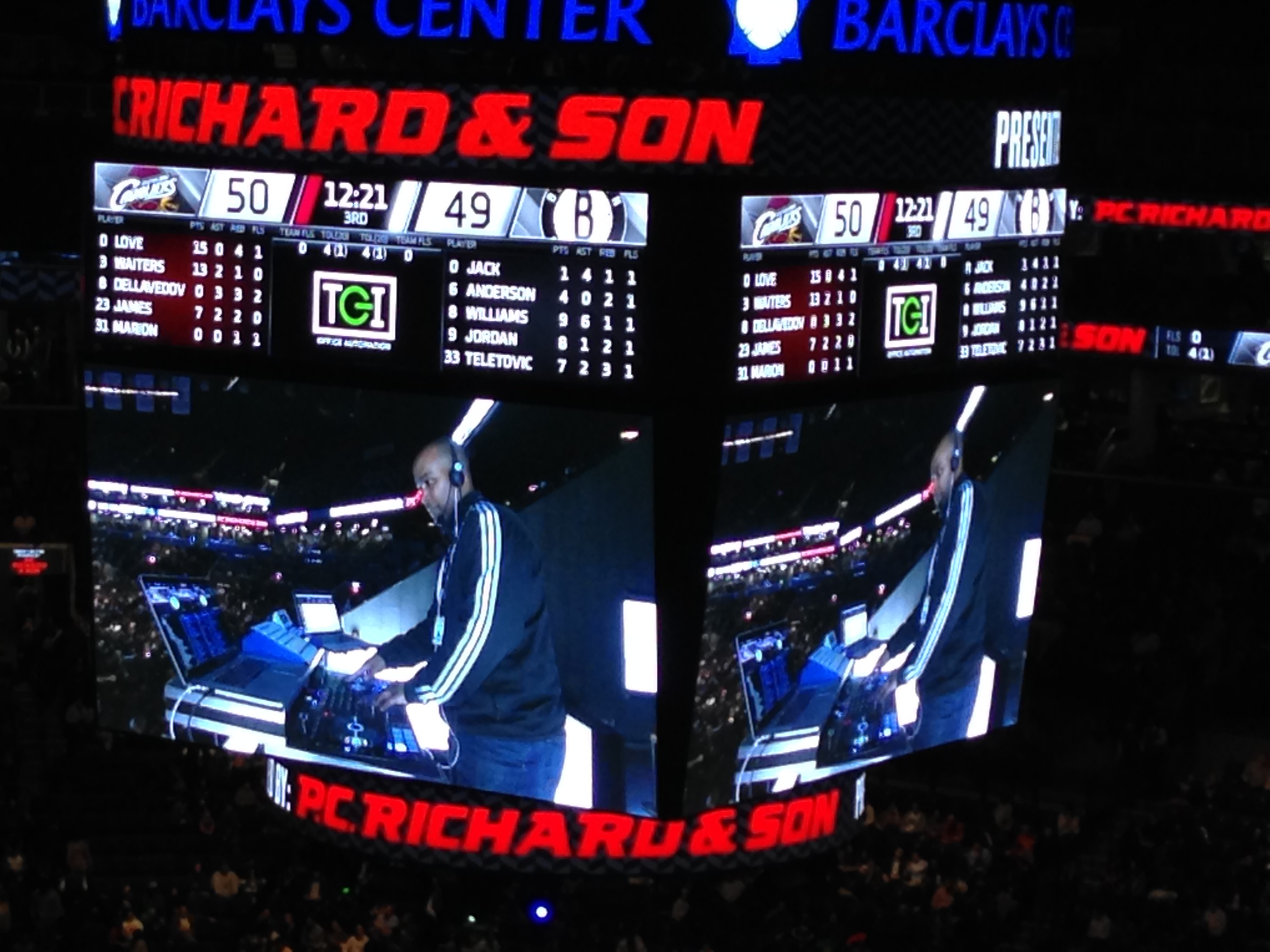 DJ M.I.L. DJ'ing at the Barclays Center during a Brooklyn Nets game.