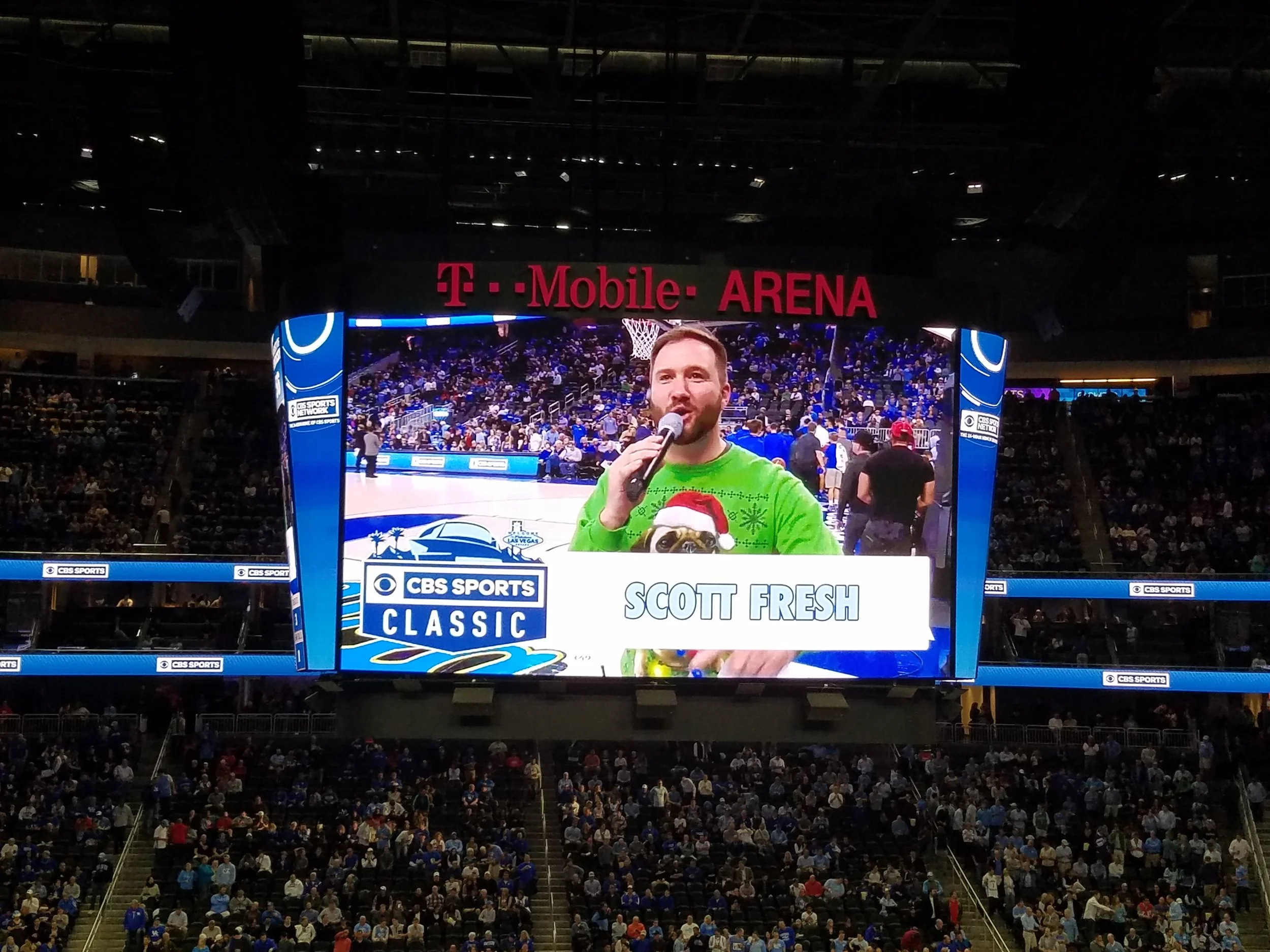 Emcee, Scott Fresh , brought energy, excitement and an ugly Christmas sweater to the 2016 CBS Sports Classic.