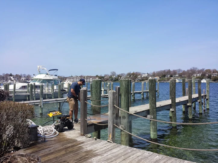 A clean dock will help prevent you from tracking dirt on your boat. We love a great May day in Charlevoix when the sun is out!