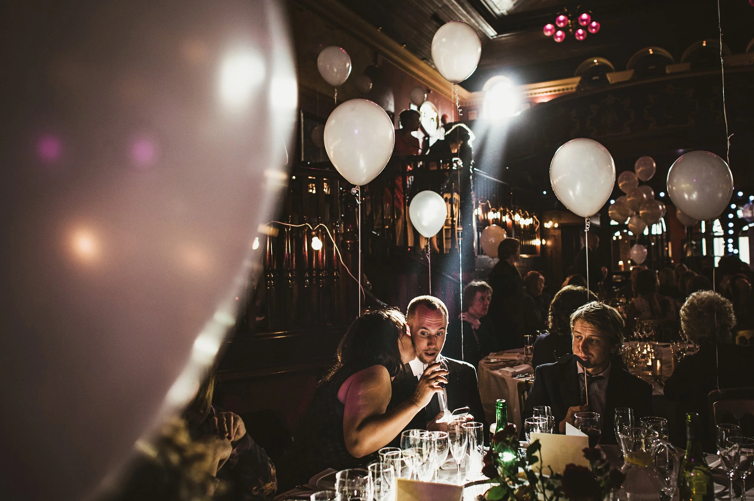 Documentary wedding photograph of image of dramatic lighting in empire music hall Belfast