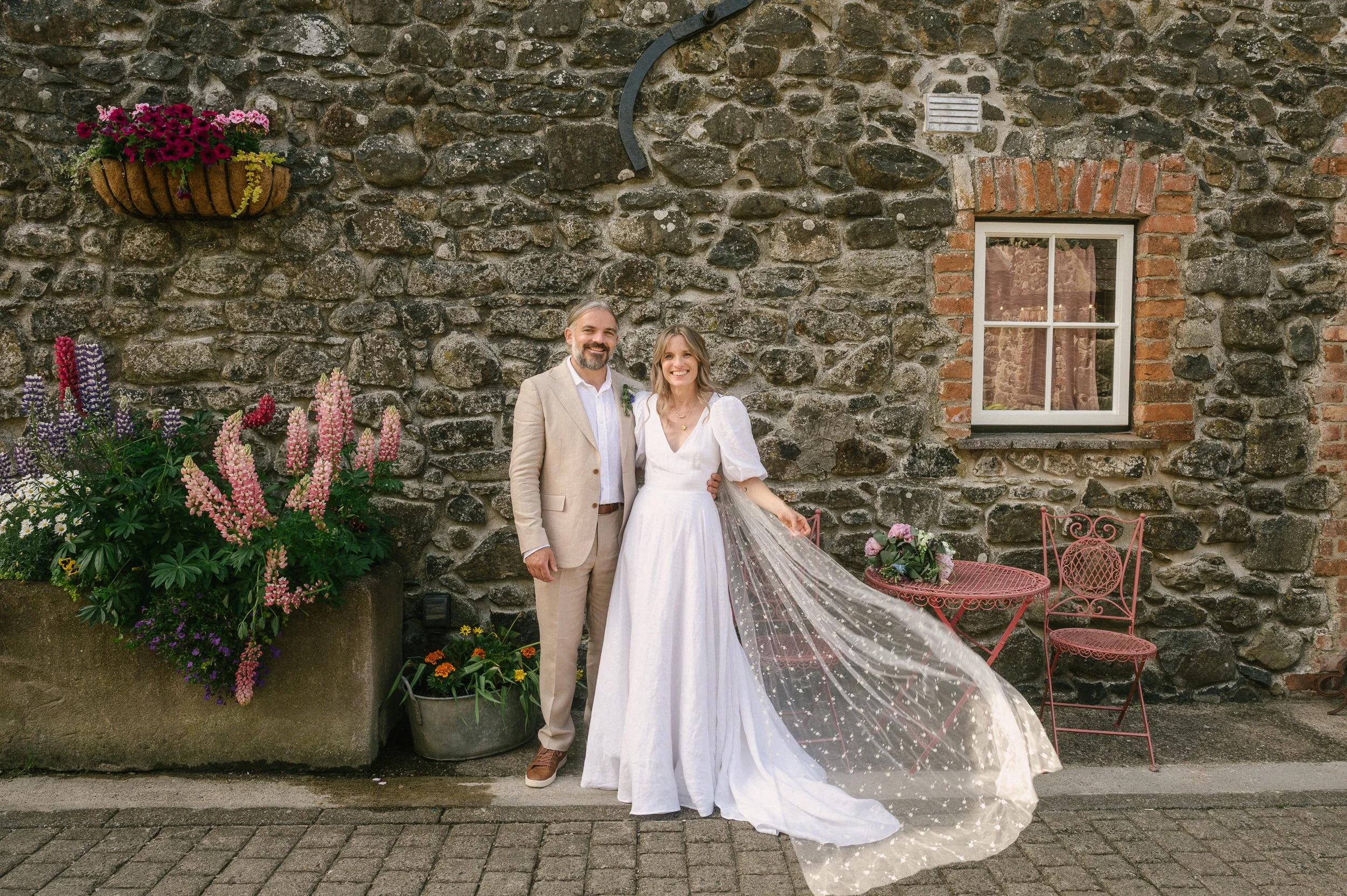 Rustic wedding photos in the cobbled lane at Limepark Armoy