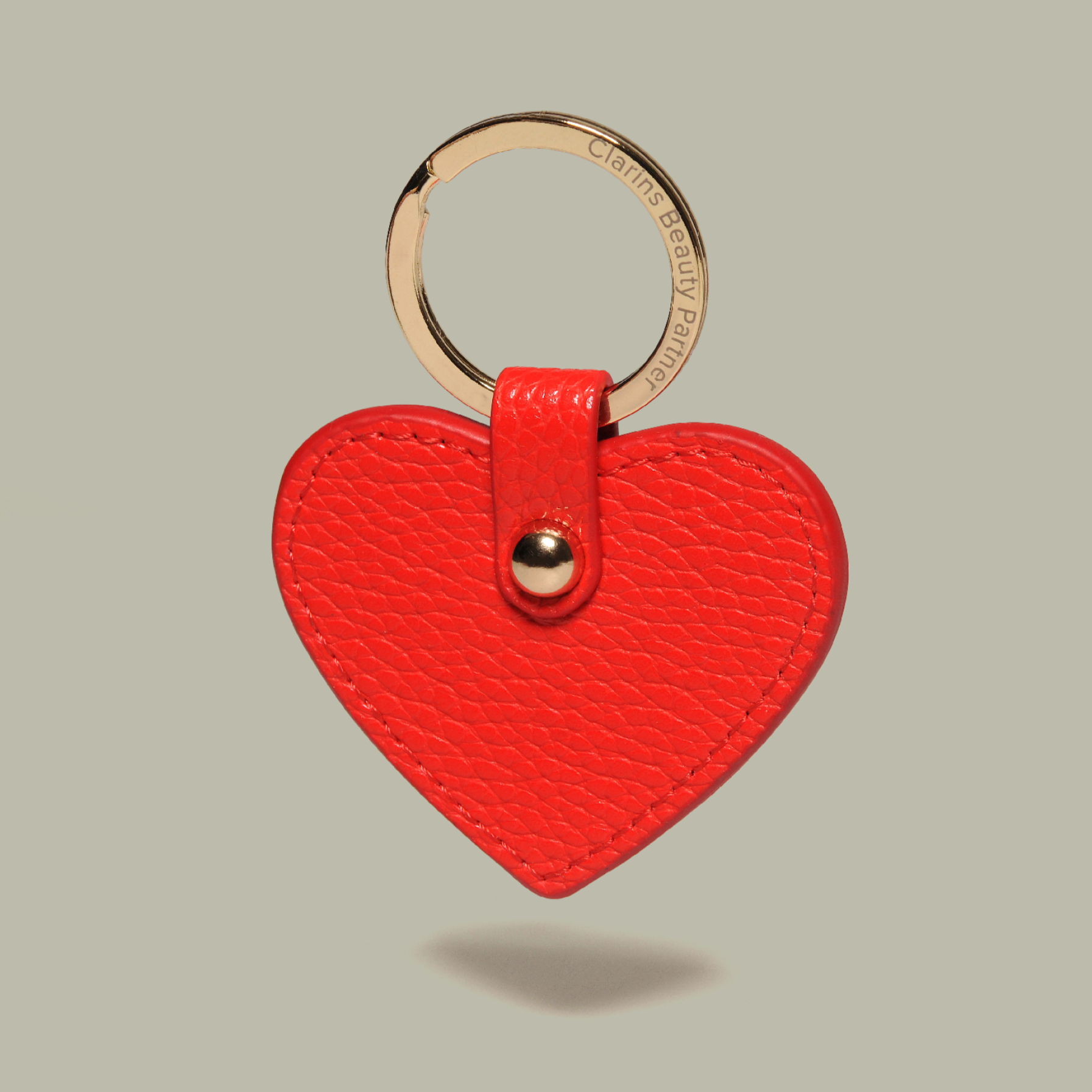 brandcraft_privatelabel_merchandise_agentur_lieferant_supplier_logo_pr%C3%A4gung_stanzen_leder_kunstleder_pu_packaging_verpackung_premium_unique_individuell_clarins_cosmetic_kosmetik_herz_anh%C3%A4nger_schl%C3%BCsselanh%C3%A4nger_mulberry_key.png