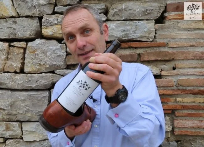 How do you open a wine bottle without a corkscrew? You use your SHOE!