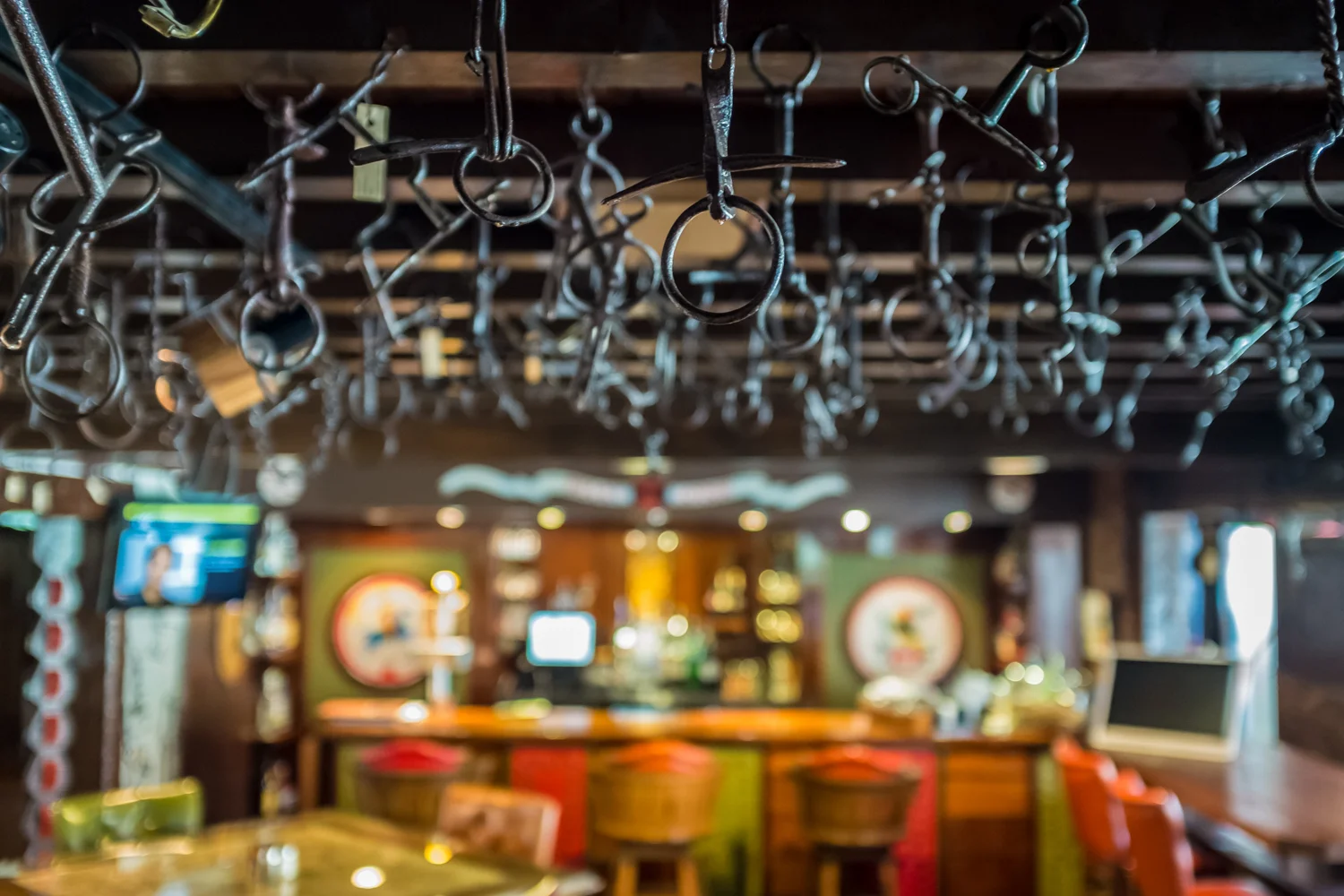 Horse bits cover the ceiling in part of the dining area at Walhill Farm Restaurant