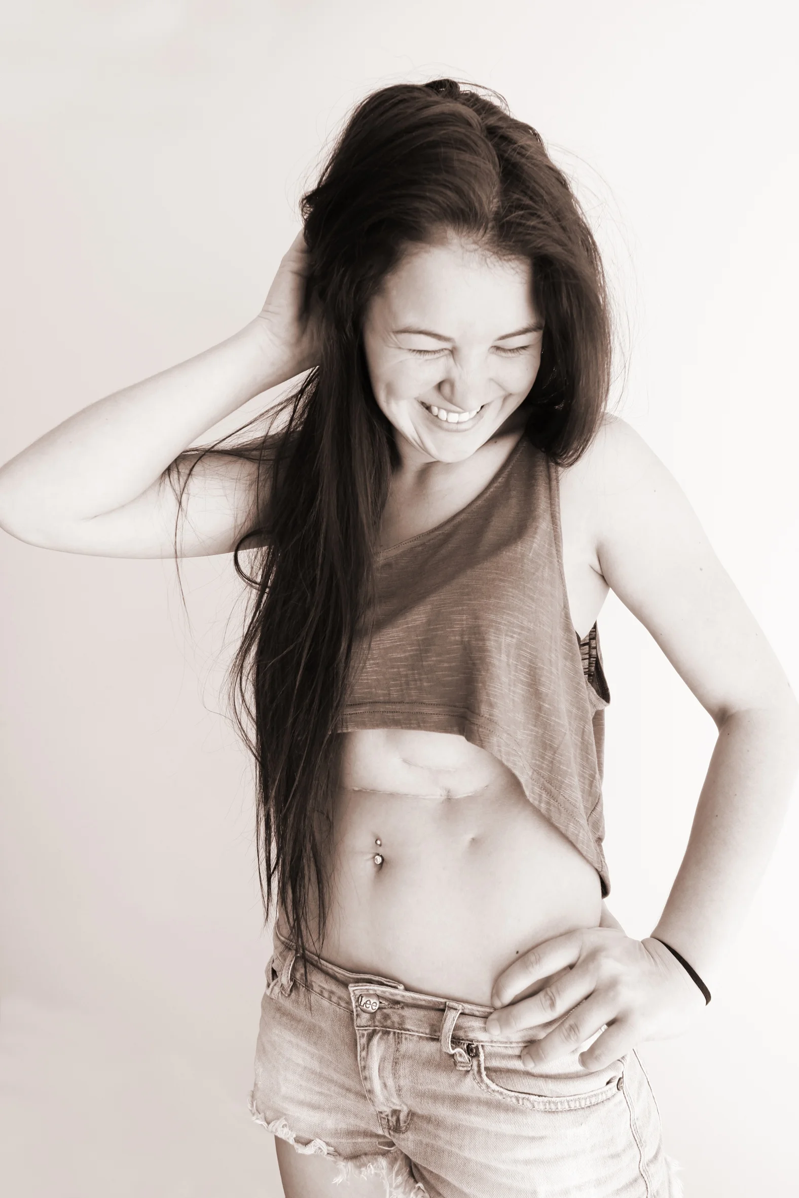 Hayley uses skateboarding to stay fit! She's a scar-rockin' survivor and she's ready to share that with the world.