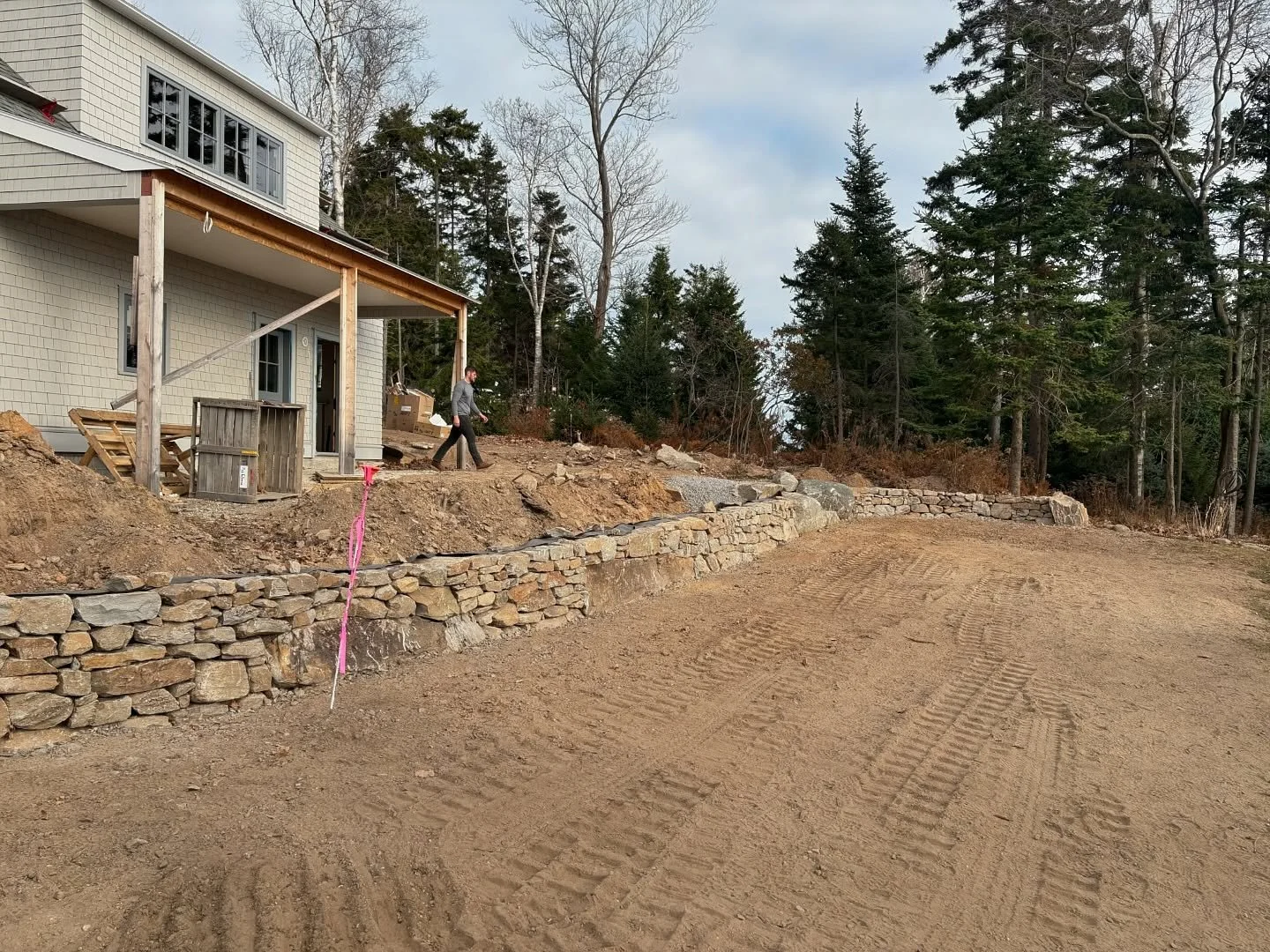 Last week we finished up this project on Long Island in Casco bay. We got lucky with the weather and the less windy side of the island. Thanks to a little island help, we were able to build this wall and steps with stones hammered from the ledge to p