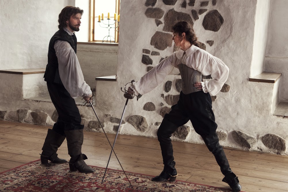  Lucas Bryant (left) and Malin Buska (right) in THE GIRL KING - Photo courtesy of Wolfe Video 