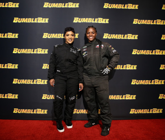   (L-R) Tia Norfleet and Brehanna Daniels attend the Glammed-Out Auto Clinic at West Coast Customs on behalf of BUMBLEBEE, in theatres December 21 (Photo Credit: Steven Baffo)  