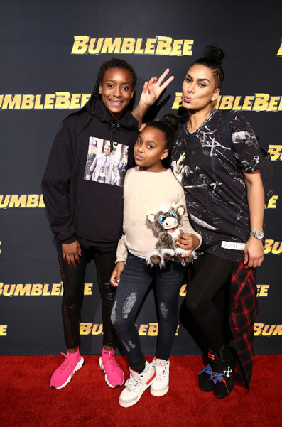   Laura Govan &amp; family attend the Glammed-Out Auto Clinic at West Coast Customs on behalf of BUMBLEBEE, in theatres December 21 (Photo Credit: Steven Baffo)  