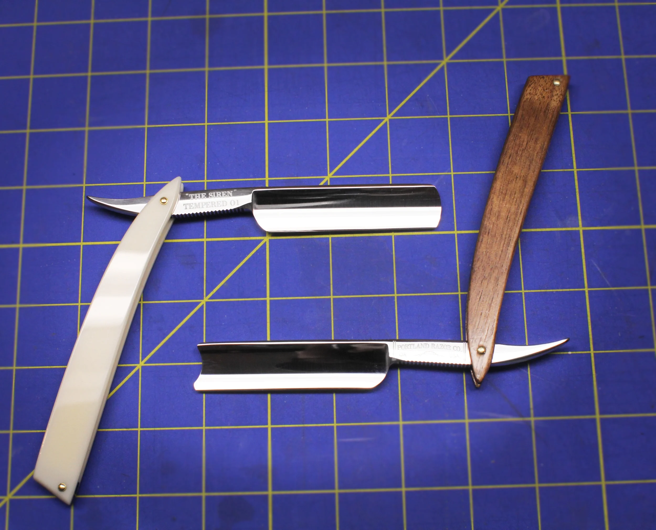 A look at two of our updated straight razors, side-by-side.