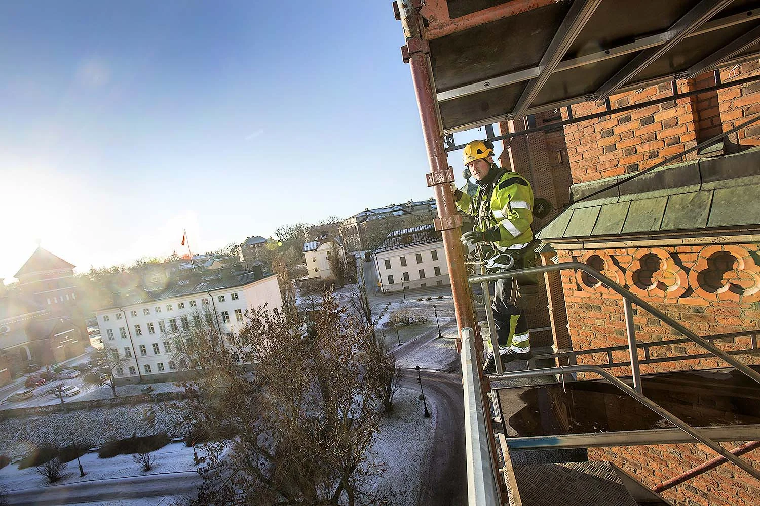 Byggnadsarbetare på hög höjd