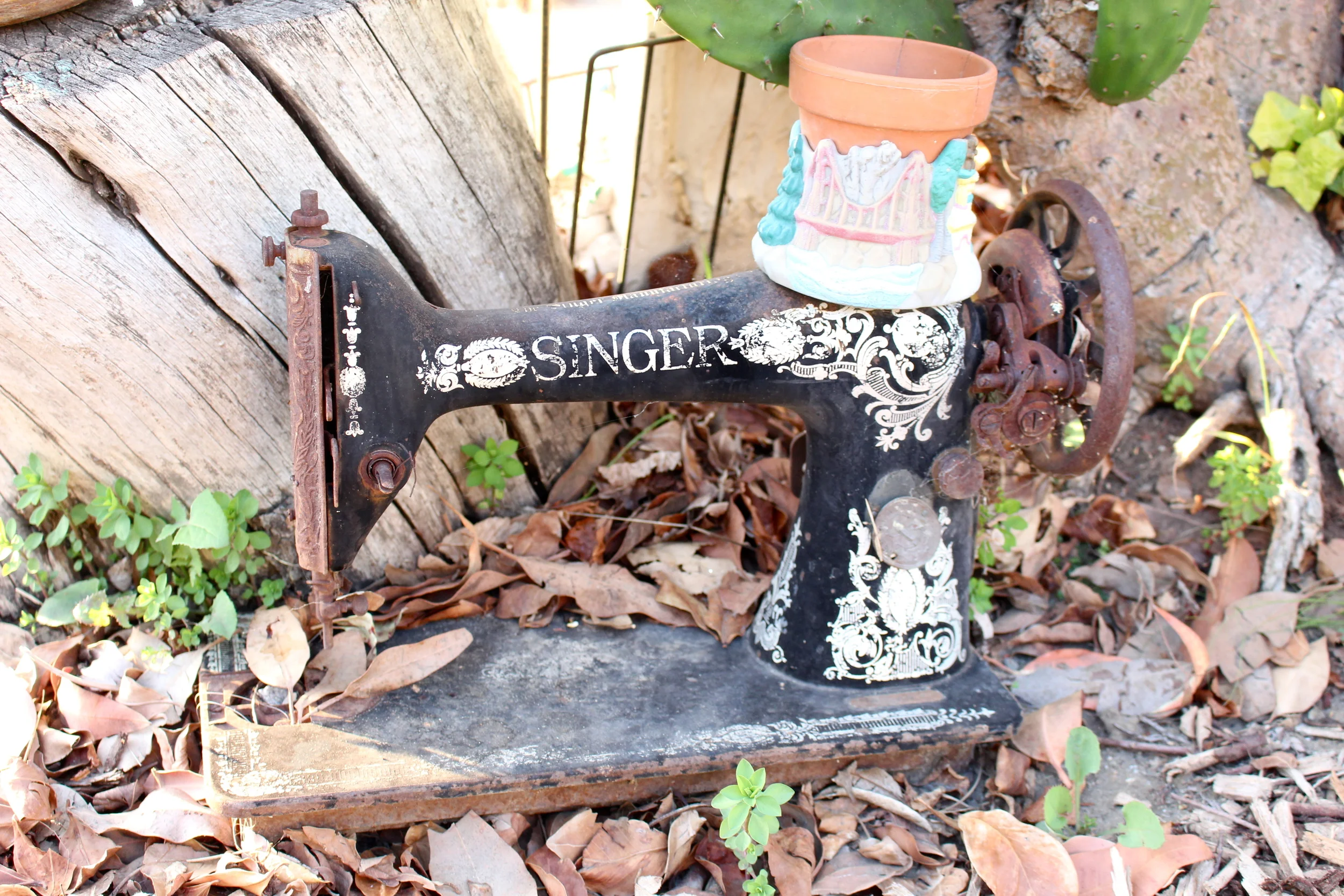 Vintage sewing machine on the side of the road