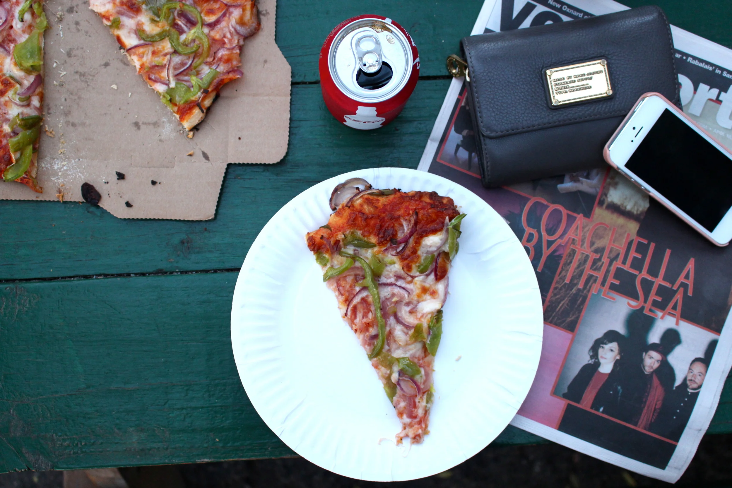 Our delicious pizza, my half at least, and then CHVRCHES over there in the corner on the cover of a local paper