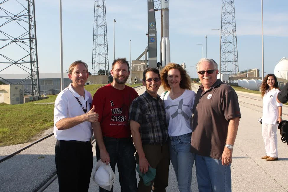 Heidi in front of Juno on the launch pad with a few other Juno team members before launch