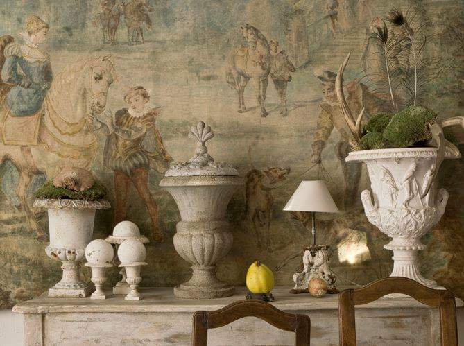 A mantel filled with urns via the MTS Tumblr .