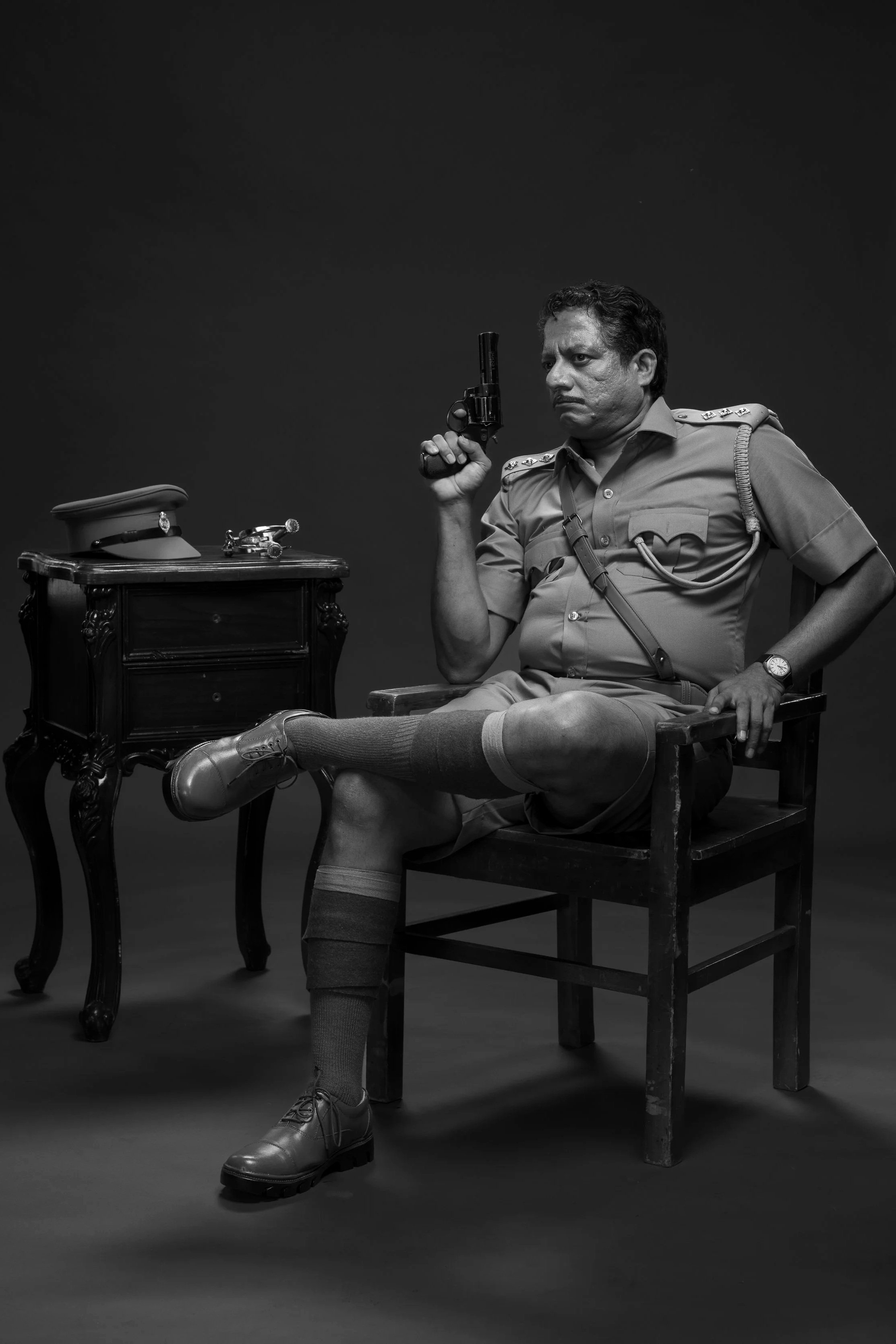 Image of actor Buks (Bagavathi Perumal) in police uniform