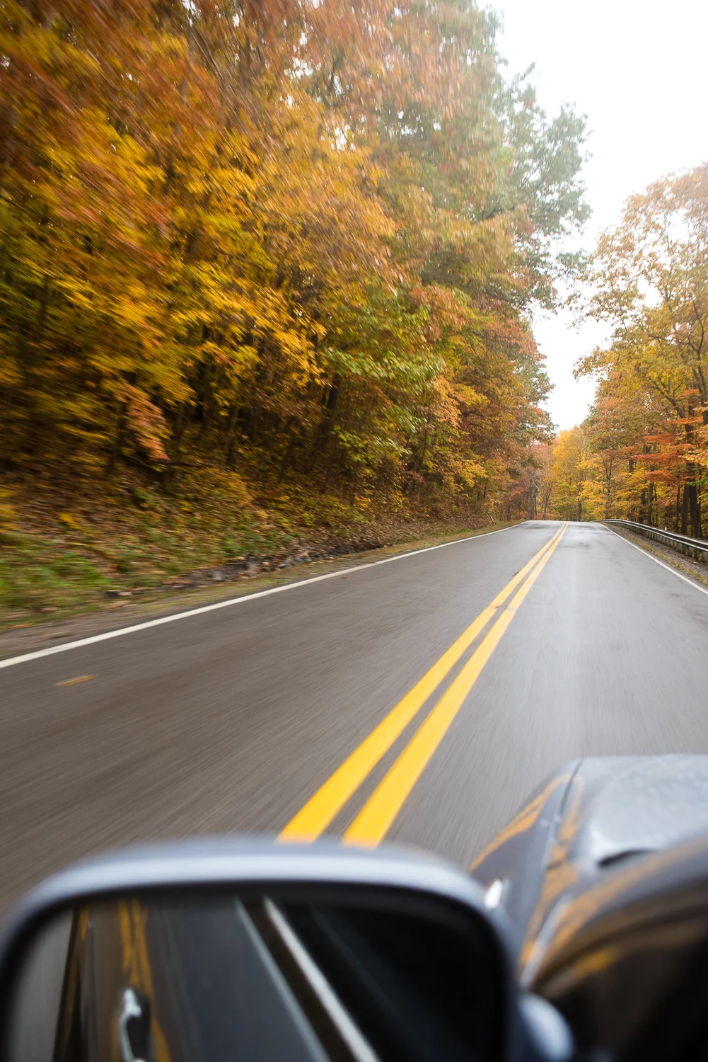 The cover shot! There's nothing like fall colors creeping up right to the edge of the road.