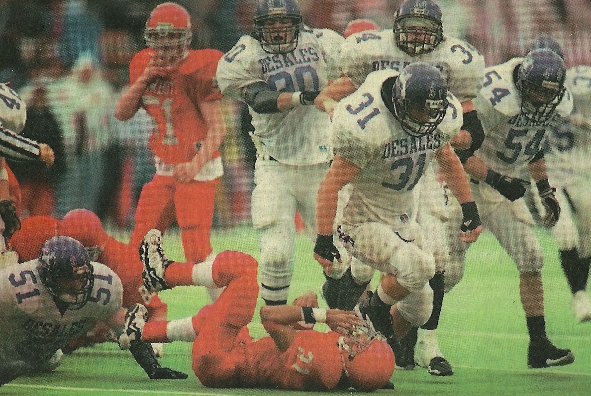 Tom Weilbacher (31) and Grant Bowman (51) combine for the stop in the 1997 State Championship game (photo credit - Columbus Dispatch)