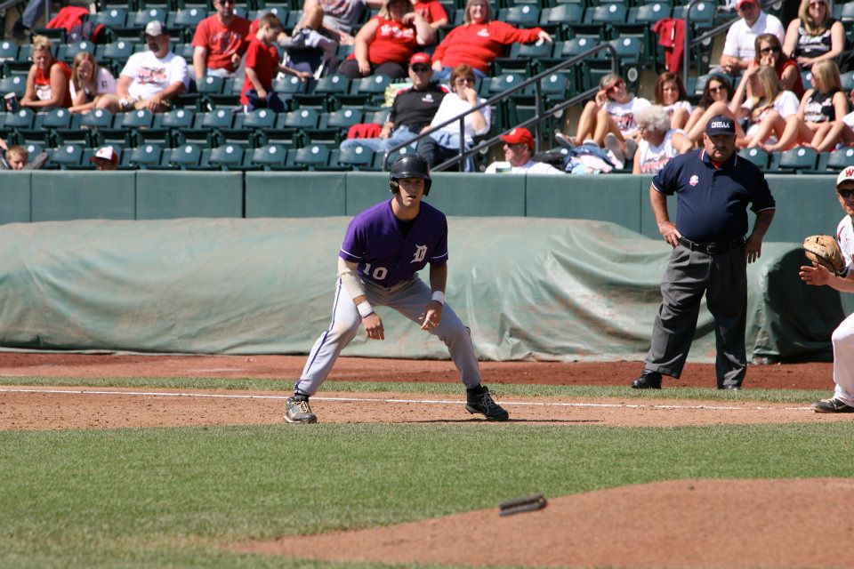 Ryan Maloney occupies first base in the State Championship game