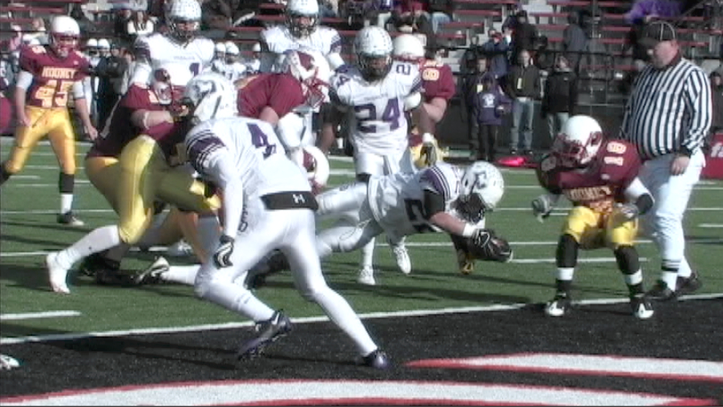 Jake Edsinger (22) crosses the goalline in the State Final