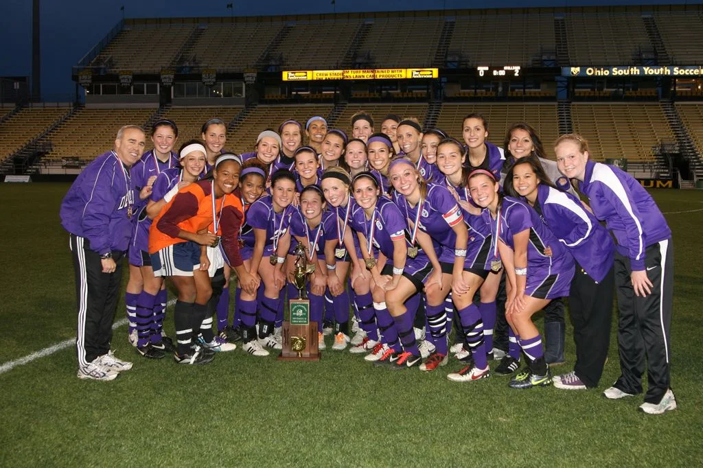 Bob McGee pictured far left with the 2011 State Championship Team