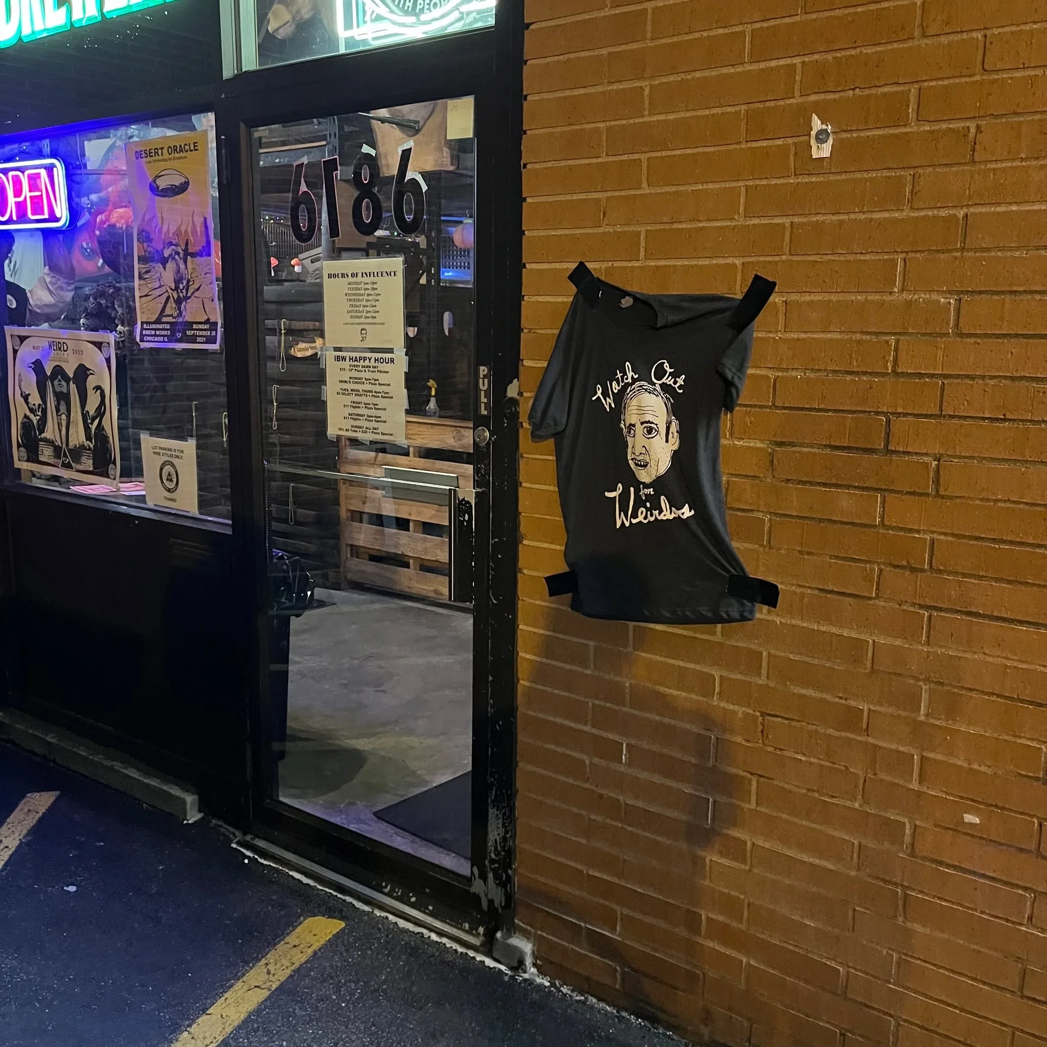One of the things I love most about this place, and will (probably) remember longer than other things, is when we are left anonymous gifts by goblins, I assume.

Heading home last night I spotted this lovely shirt duct taped to the wall outside the L
