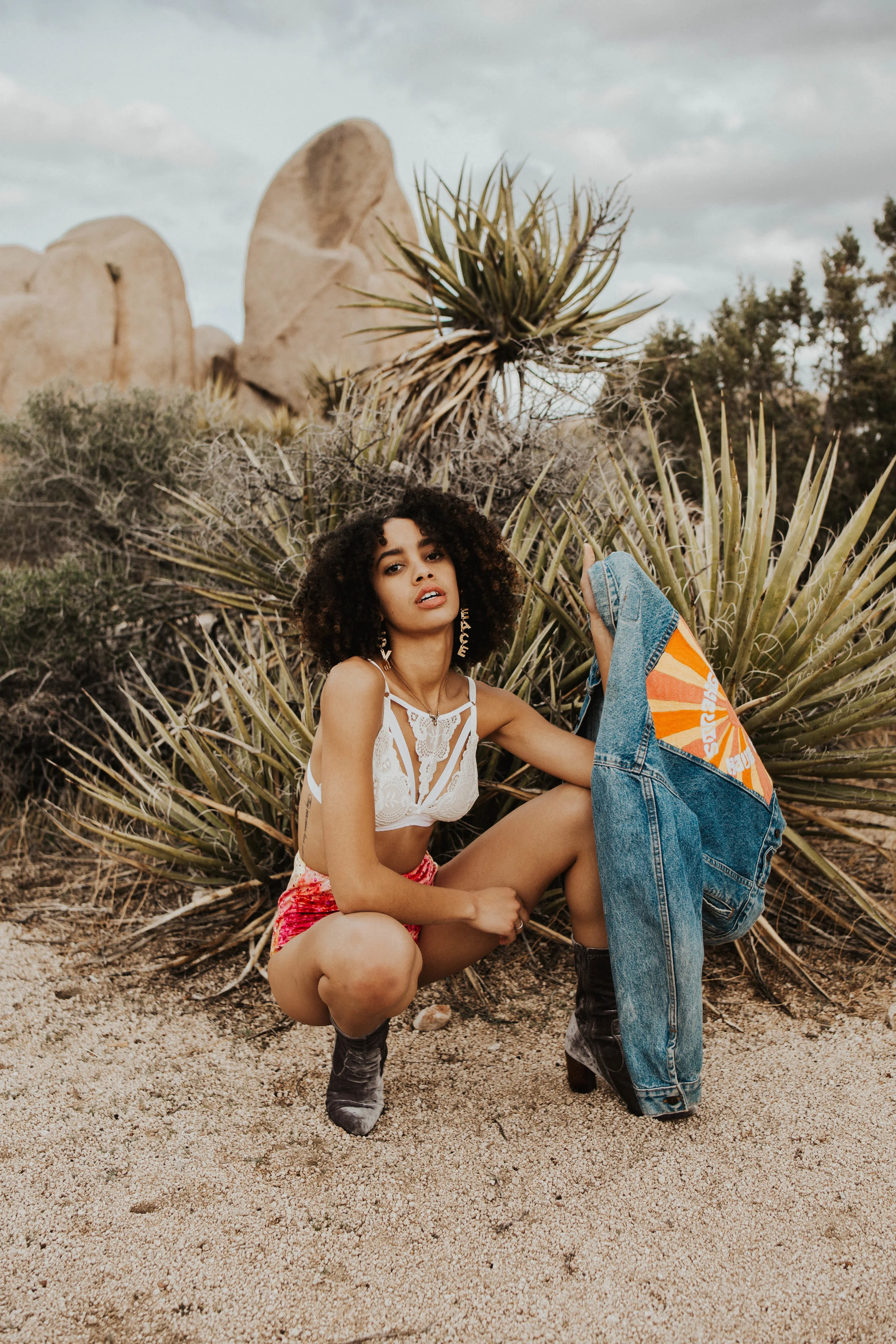 Leah is wearing our Peace + Love dangle earrings and our Dainty Ox Head Necklace . - Shot by @Lexihaslem