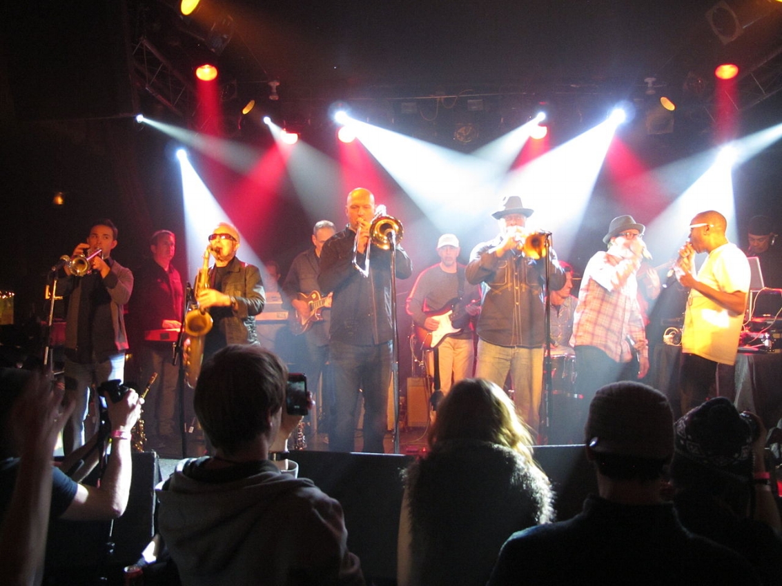 Mars Williams- Sax Tom Klein – Guitar Ricky Showalter – Bass Walter "Dirty MF" Sargent MCBrian "MCB" Quarles – MC Devin Staples – Drums Ron Haynes – Trumpet Johnny "Showtime" Janowiak - Trombobe David “My Boy Elroy” Arredondo – Turntables & Beatbox Doug Corcoran - Trumpet & Keyboards