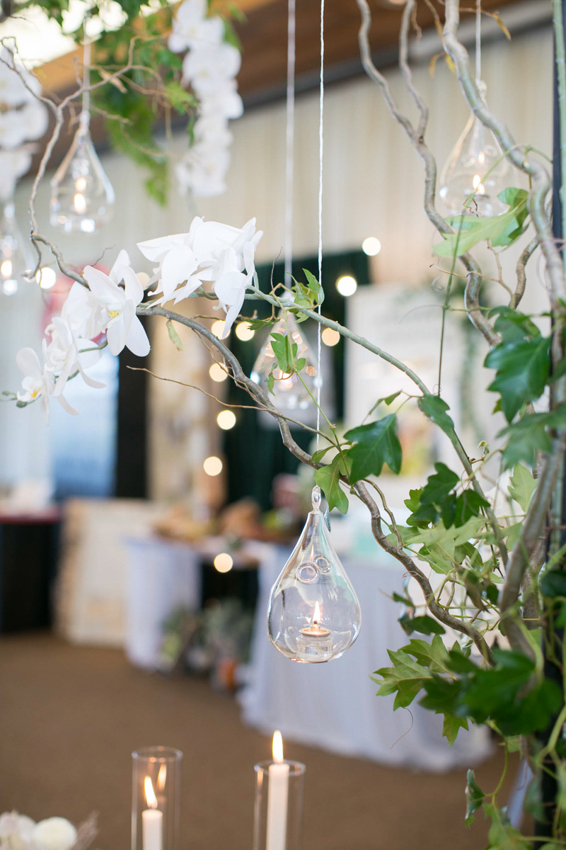 wedding day decor with hanging orchids