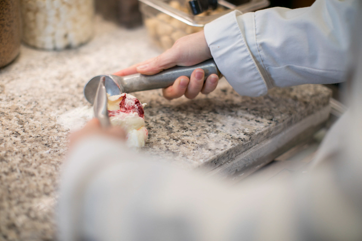 marble slab ice cream being prepared to serve