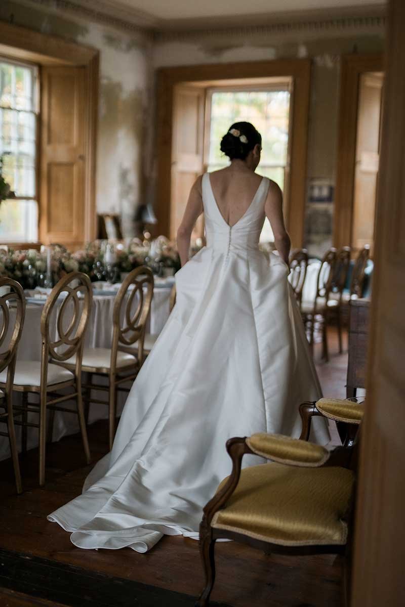  Bride walking through her reception venue.  