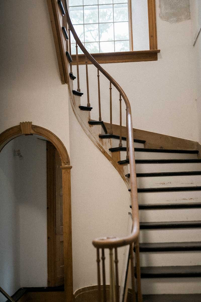  Historic estate wedding venue staircase. 