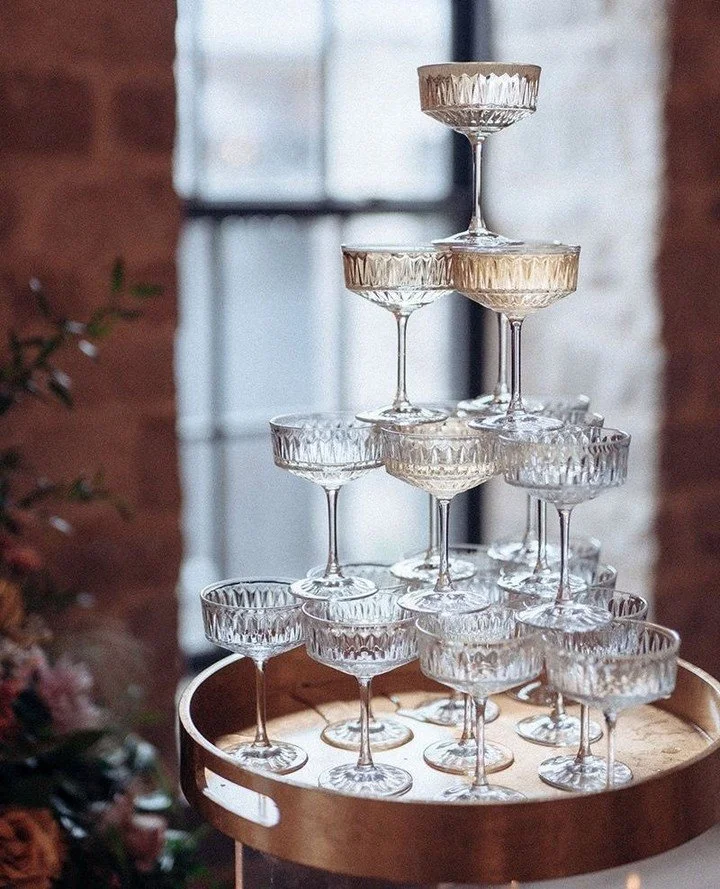 A toast to love, laughter, and happily ever after! A champagne tower is the perfect reminder that the little details make a celebration truly unforgettable. Here&rsquo;s to new beginnings and a sparkling year ahead! ⁠
⁠
&mdash; The Vineyard Bride Tea
