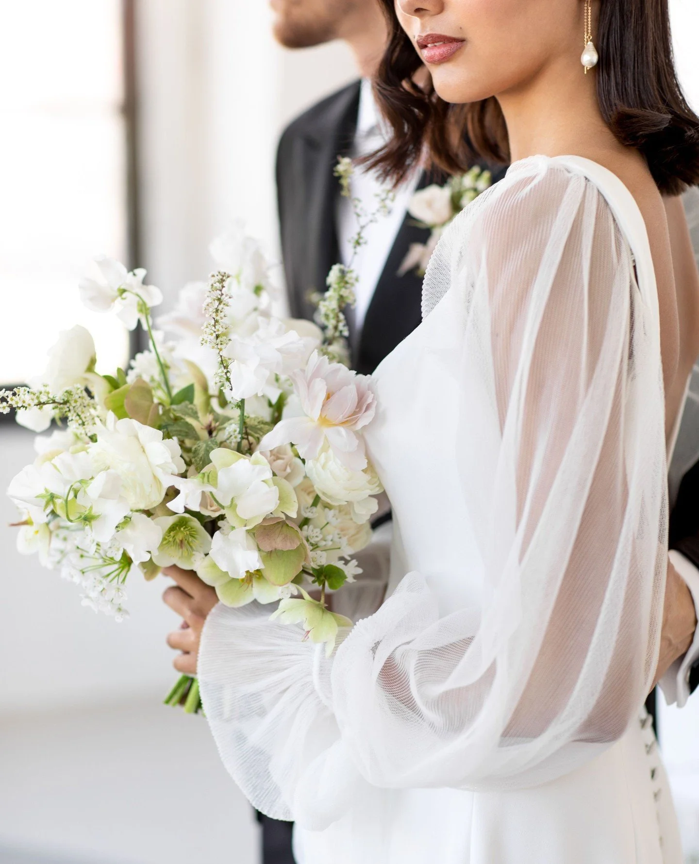 Based in Niagara, Livi Shaw is a wedding photographer known for her refined, natural-light aesthetic and calm, intuitive approach. With over 12 years of experience and formal training at Sheridan College, she blends documentary storytelling with gent