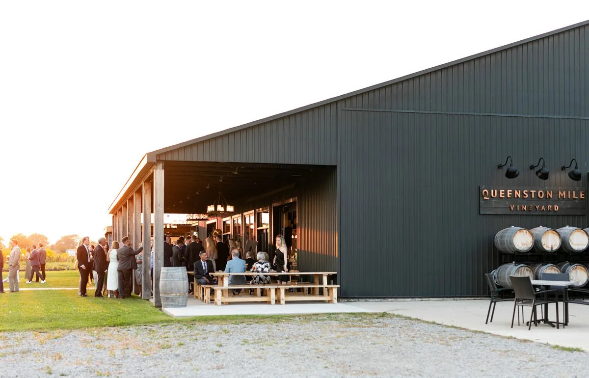 outdoor cocktail hour at a winery wedding guests mingling