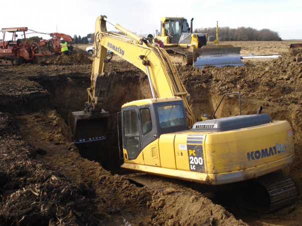 windmill backhoe in hole, back view.jpg