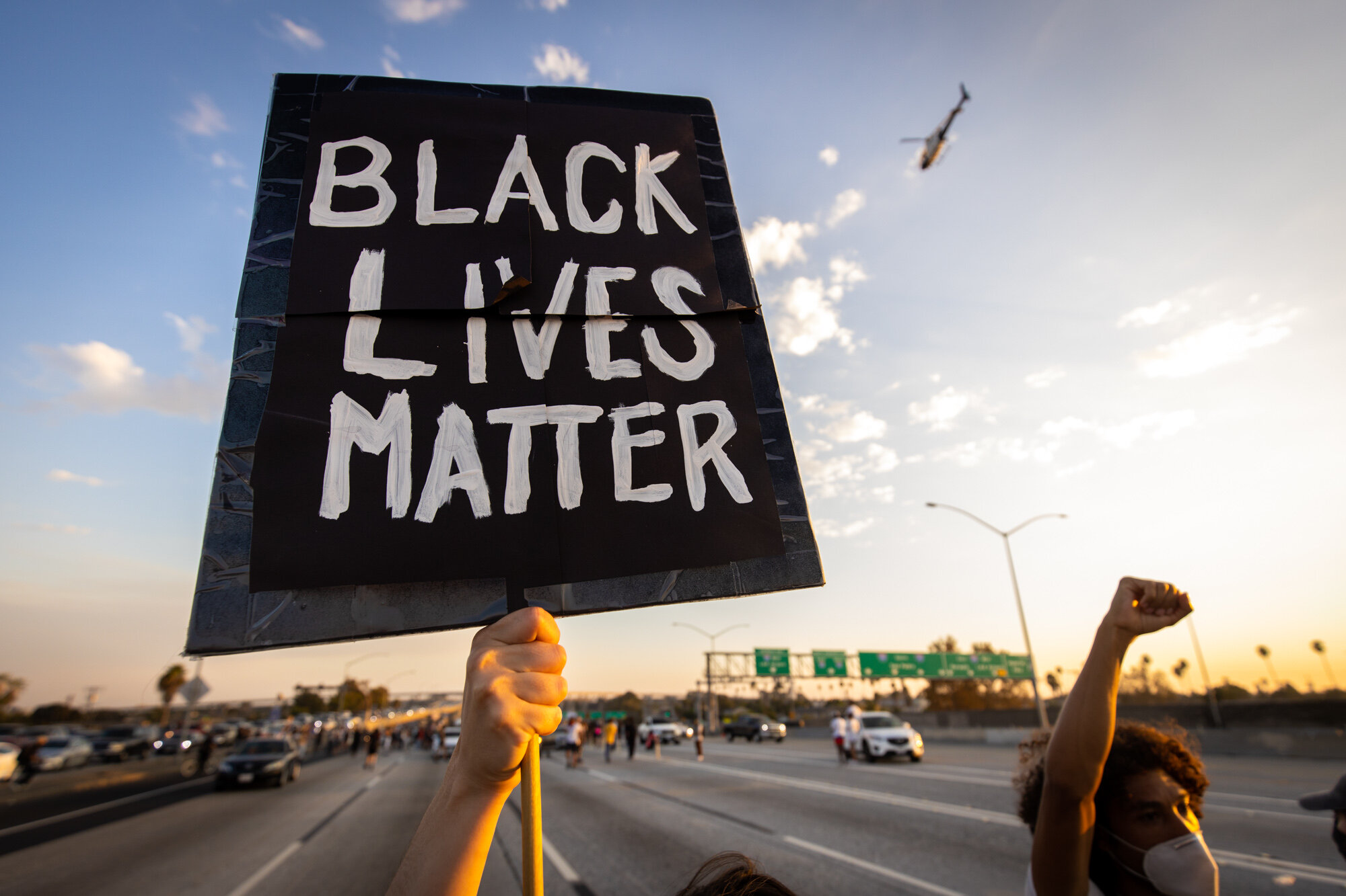  Protesters block the 110 freeway while marching for the death of Dijon Kizzee in South Los Angeles. (Brian Feinzimer) 