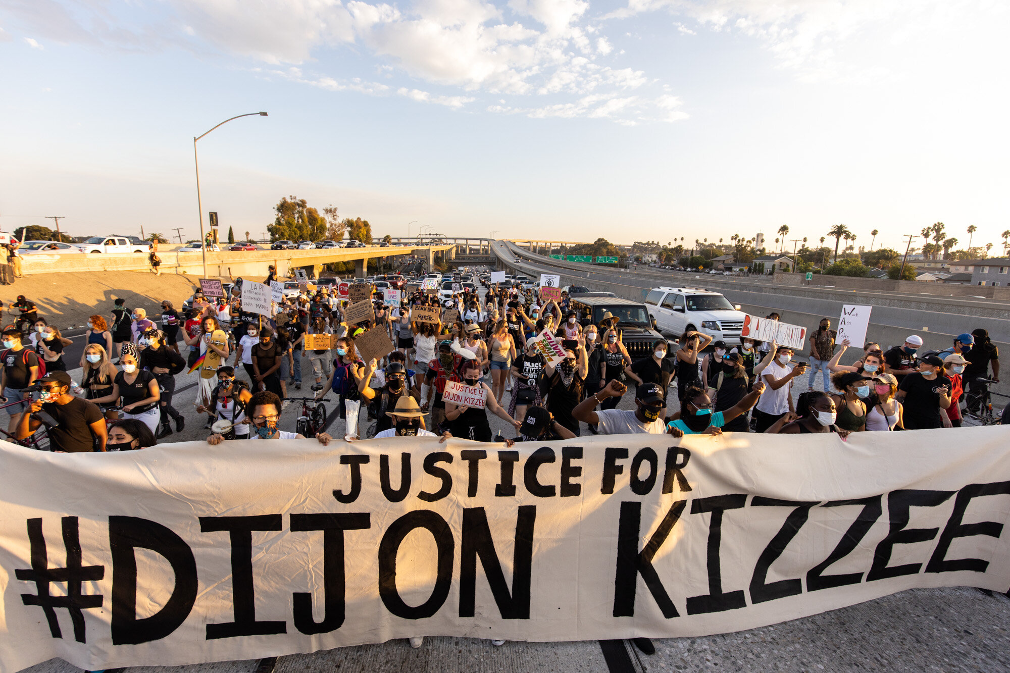  Protesters march for the death of Dijon Kizzee while on the 110 freeway in South Los Angeles. (Brian Feinzimer) 