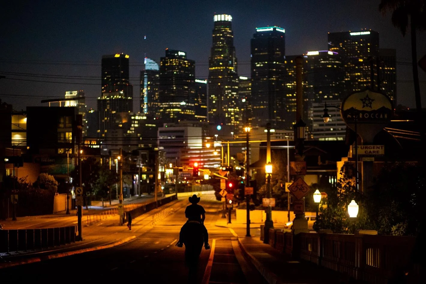 A demonstrator rides a horse into Downtown Los Angeles while protesting the Exide battery plant’s pollution of Southeast L.A. and resulting court cases on October 19, 2020.