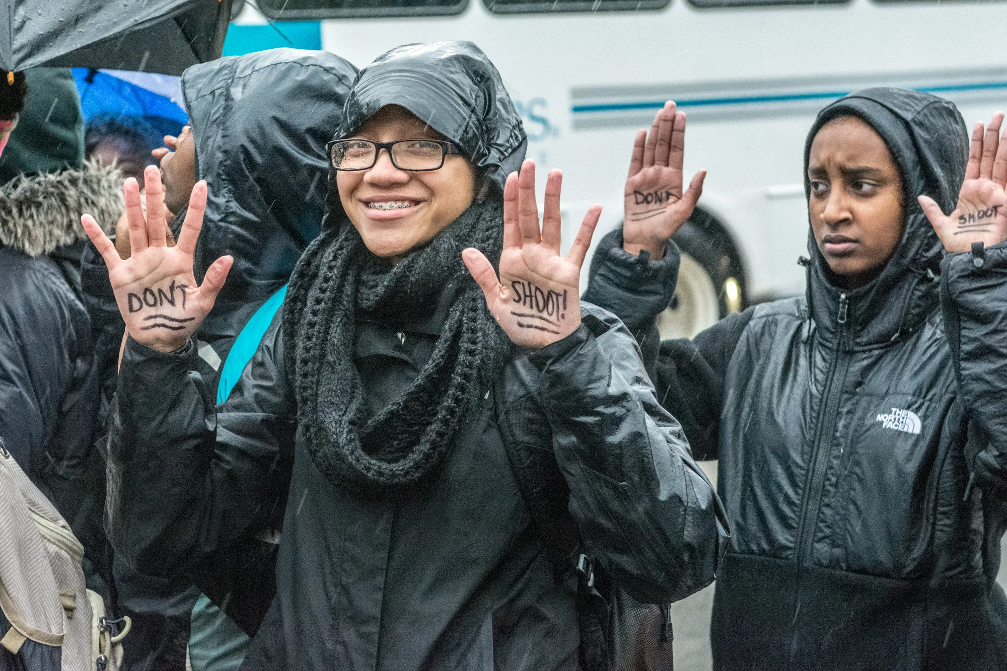 Many of the students wrote on their hands "Don't Shoot" but it didn't take long for the rain to wash it away