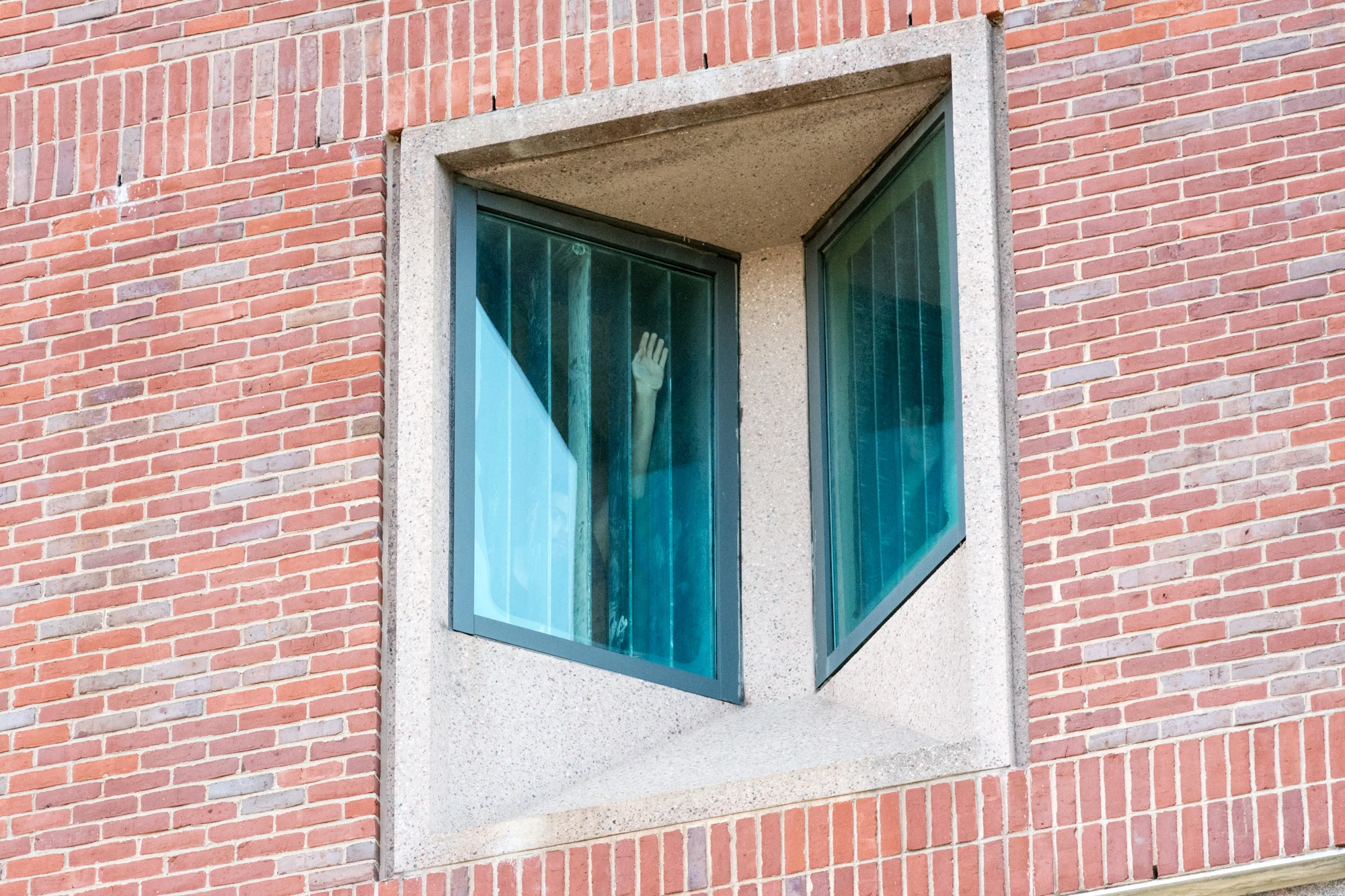 Prisoner through the window of the jail