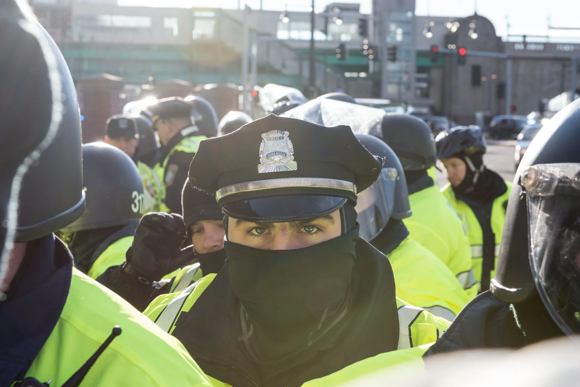 Behind the line of helmeted officers were dozens more in the street