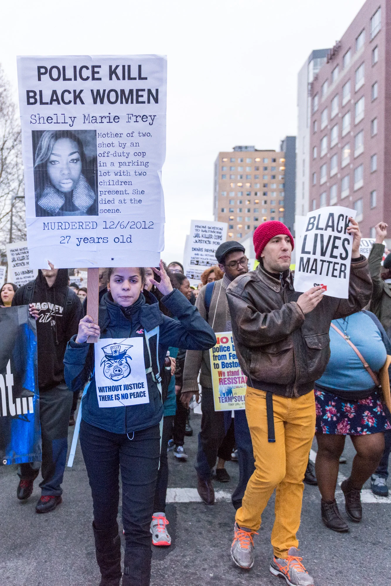 Women holding a sign for Shelly Marie Frey