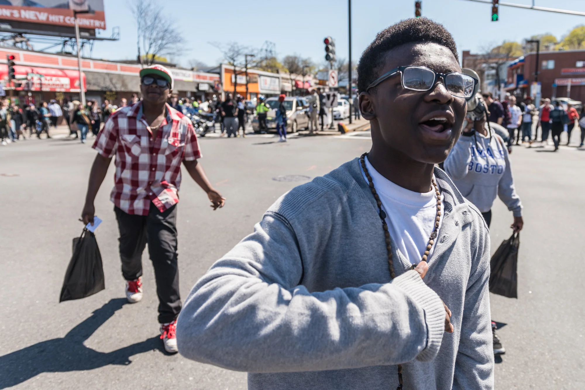 Protesters leaving the intersection and continuing the march