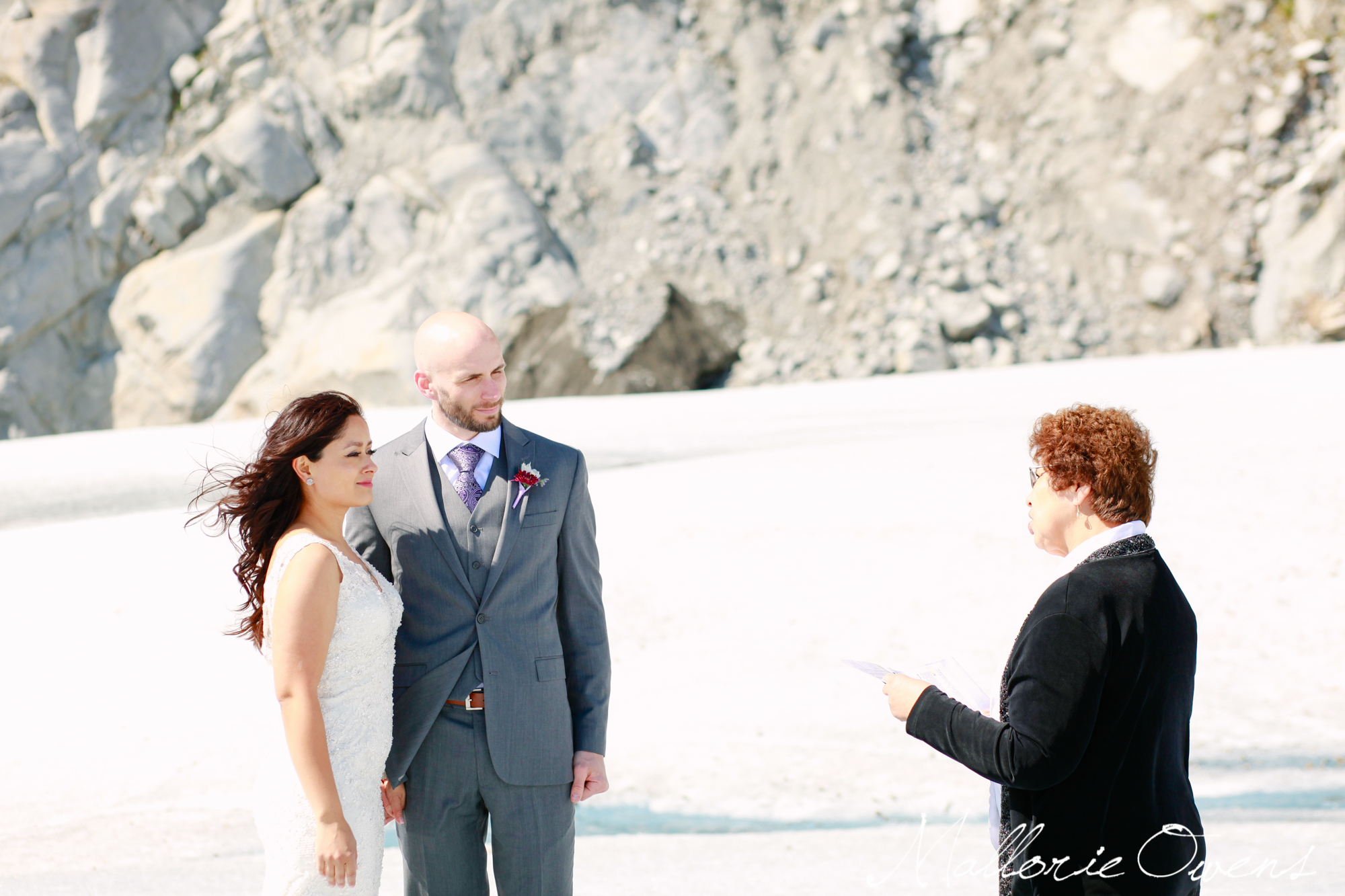 Bride and Groom on Mendenhall Glacier in Juneau, Alaska | MALLORIE OWENS