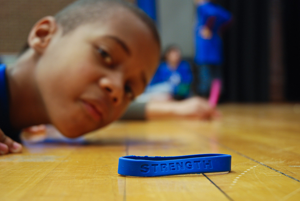 little dude from the program showin' me his strength.