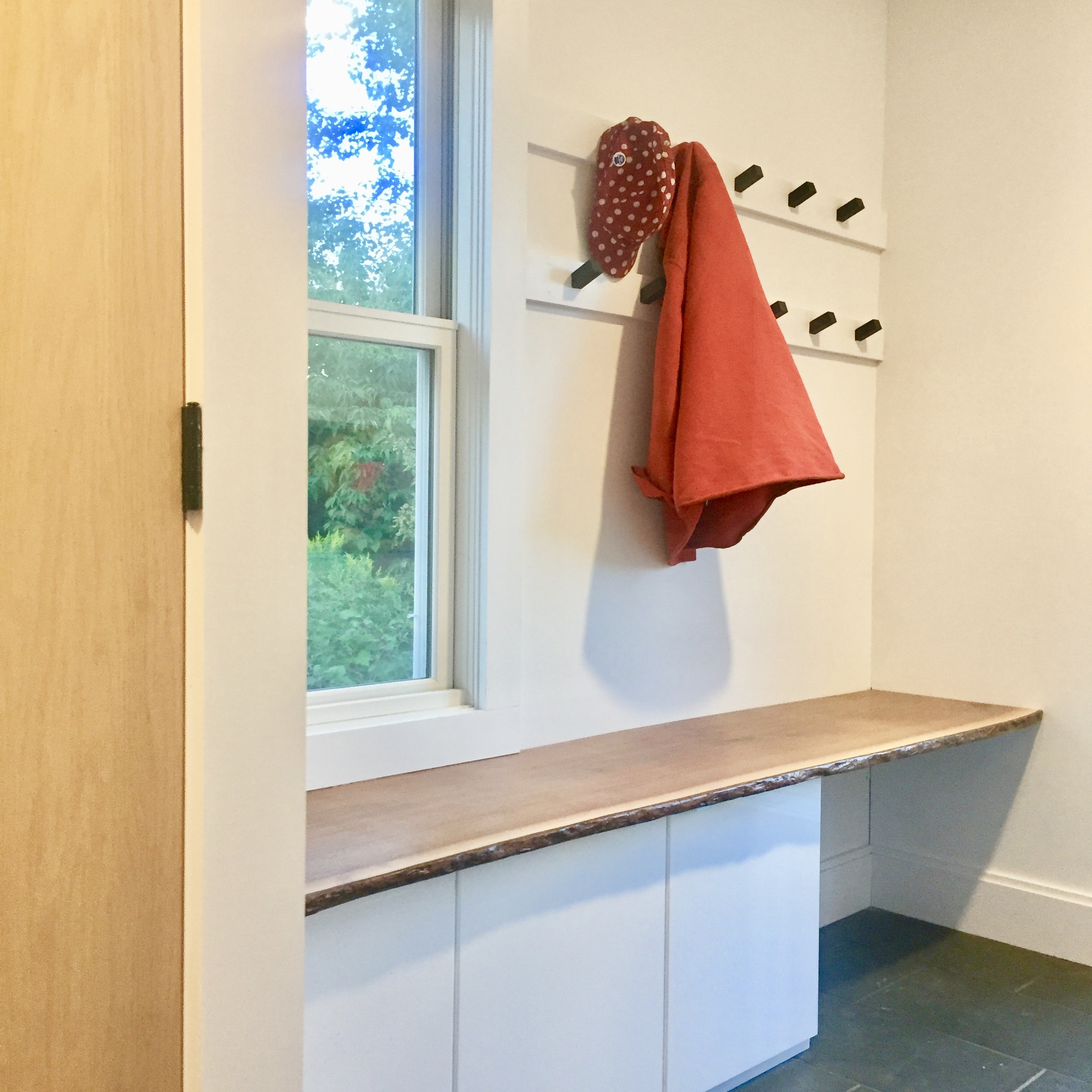 Who doesn’t like a mudroom? And live-edge walnut? Storage and containing the mess was the name of the game here. The mudroom/laundry has brand new LG Steam washer and dryer, a counter for folding laundry, and closets, cubbies and hooks for all of your outdoor gear.