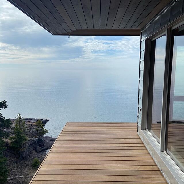 Calm Friday morning on Lake Superior. 
#lakesuperior #ipe #moderncabin #modernhome #basalt #cleanwatersupportsus @loewenwindows @millenniumforms @advantagelumber