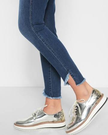  These jeans have a staggered hem which is very on trend right now! Adding to the frayed hem trend as well, mixing and matching these hot trends can add more flair that one thought was possible to your old, blue denim.  