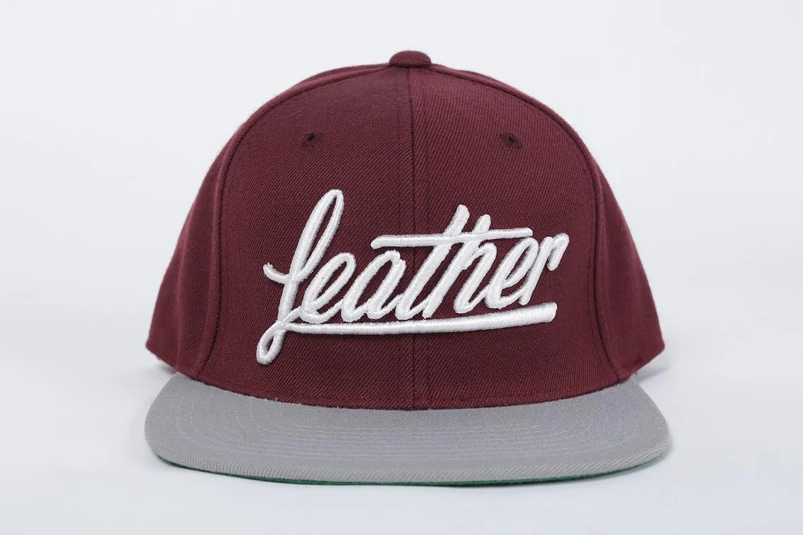 feather burgandy hat.jpg